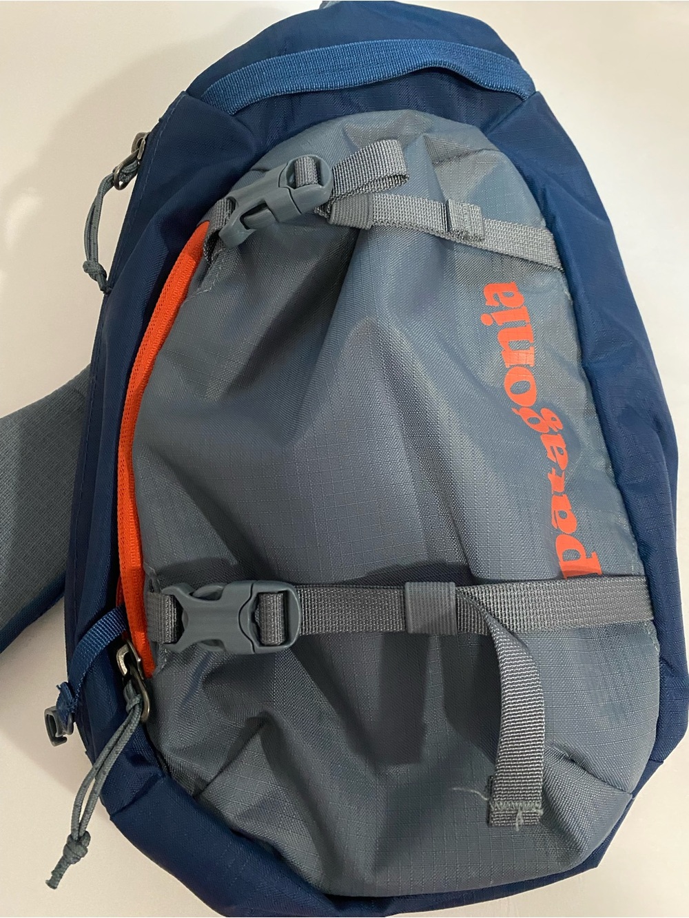 Patagonia Atom Blue and Gray Sling Bag Used